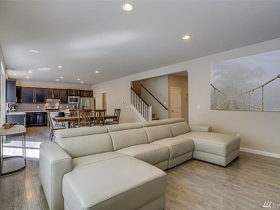 Desirable open floor plan allows for effortless flow from the living room to the dining room to the kitchen!