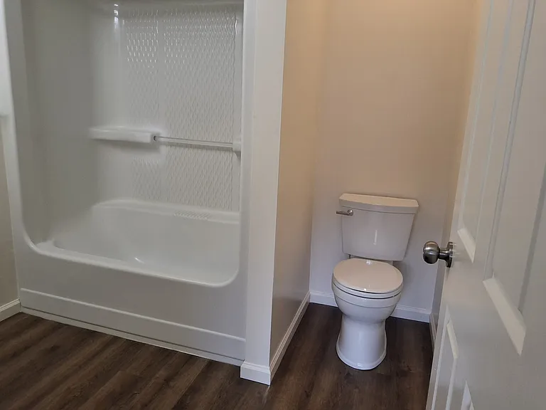 Master bath offers new sink, cabinet and commode with plenty of storage for all your linens.