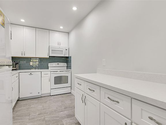 4th image of 10115 44th Way S #409