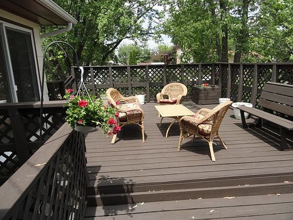 Two Tier deck with sliders from kitchen and family room