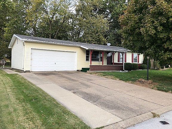 Front with expanded driveway