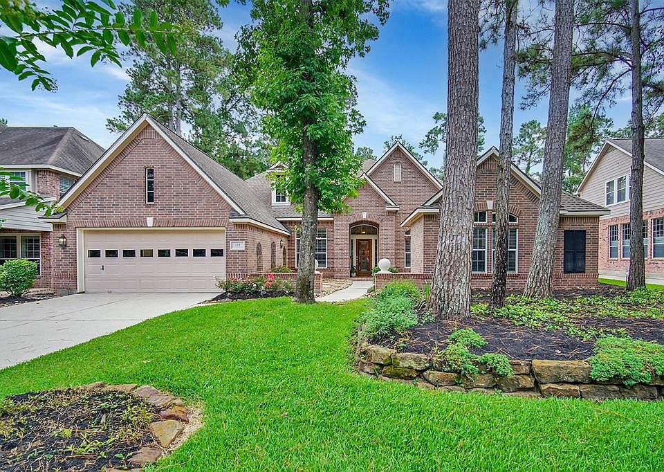 Pull up to your new home and enjoy the refined landscaping.