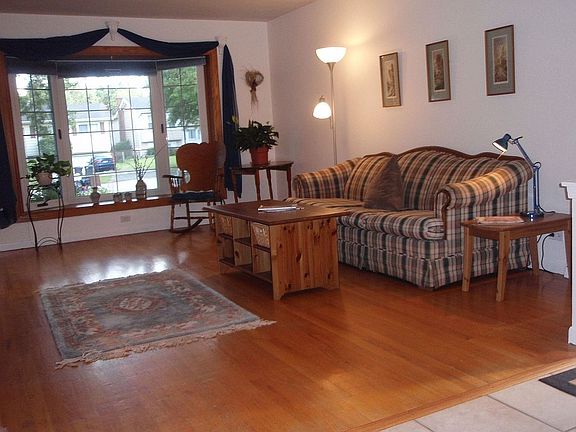 Newer bay window & wood flooring