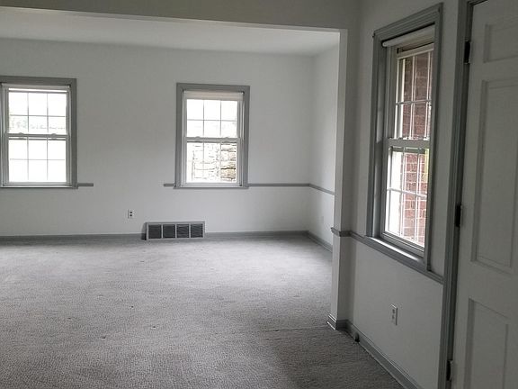 The living room new carpeting space, 24X13 off Kitchen