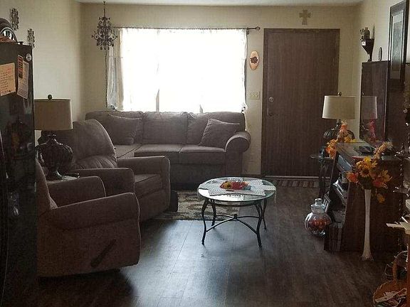 Living room with furniture in it (comes not furnished).