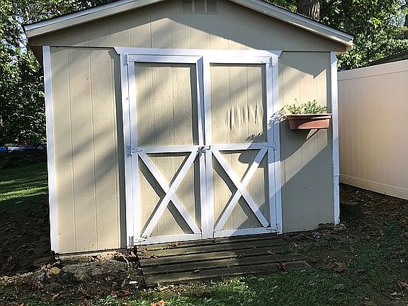storage shed with new roof