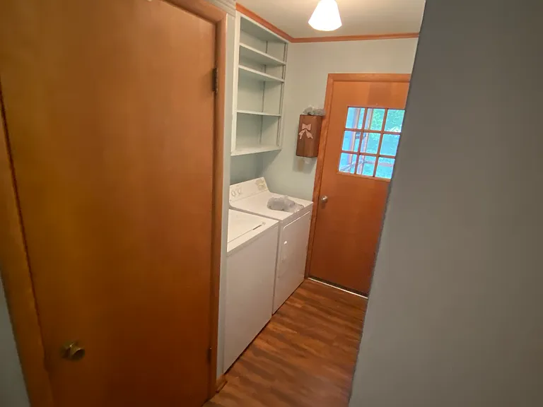 Laundry room complete with washer and dryer