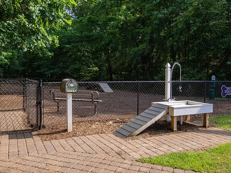 Elevate your apartment living experience with our on-site dog wash, a stone's throw from our colossal dog park. Rinse off your furry companion with ease before returning to your immaculate apartment. At River Bluff, we've got you and your pet covered.