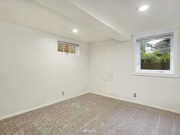 Large, bright bedroom with closet.