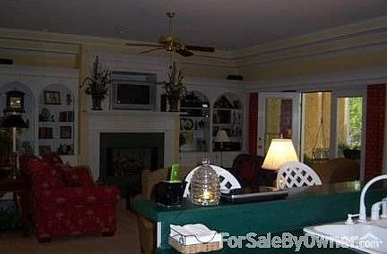 Great Room : Double box, smooth 9' ceilings with extensive workwork.