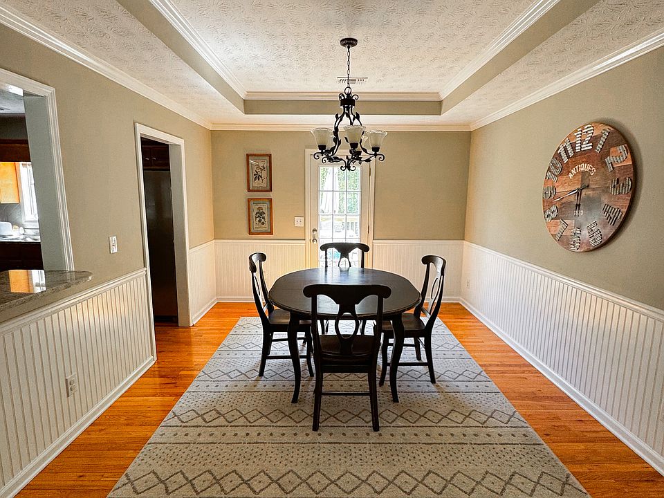 Upgraded dining room with bead board detailing.