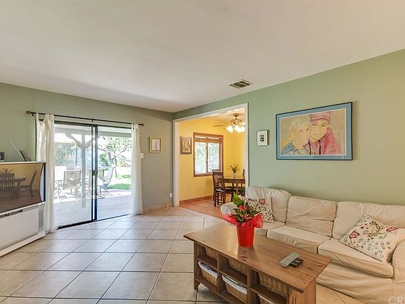 Living Room sliders lead to outdoor space.