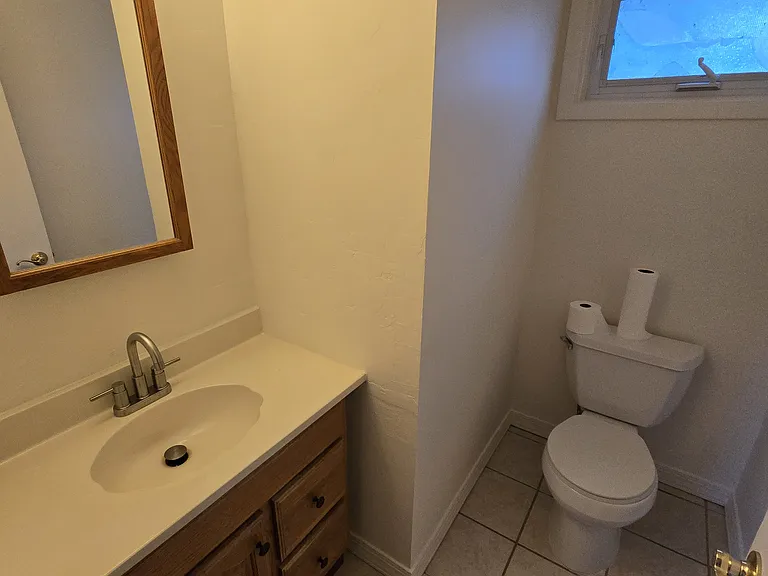 1st Floor Half Bath off of Kitchen