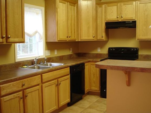 Kitchen has Large Cabinetry Capacity, Breakfast Bar, 