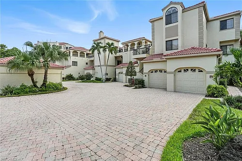 7032 Pelican Bay Blvd #E-304 Photo 1