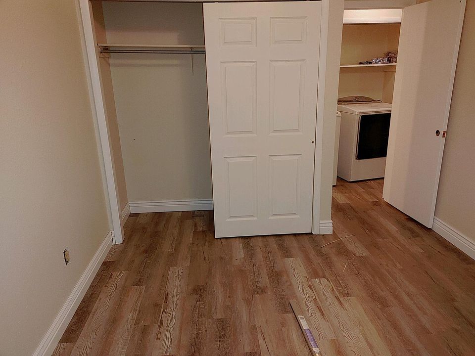 Freshly painted closets with new flooring.