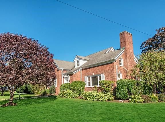 Another view of this stately brick cape cod/colonial