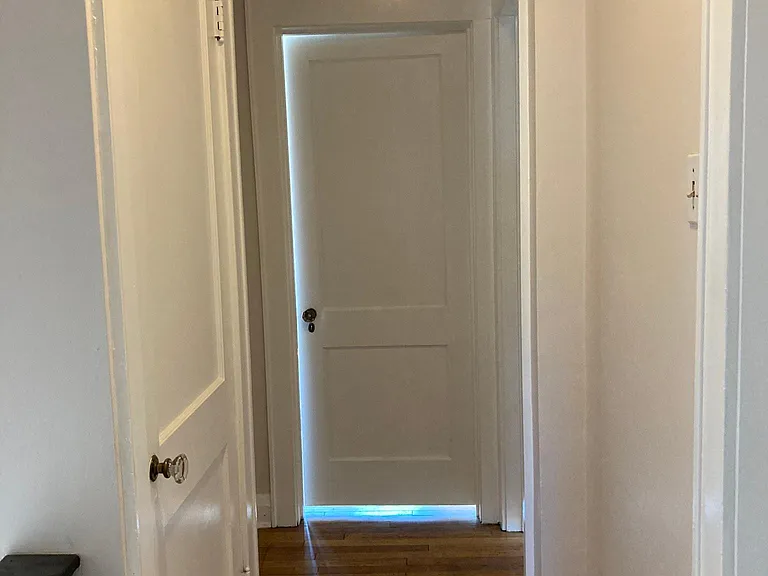 upstairs hallway, bathroom behind, and three bedrooms plus an attic upstairs that can also be a bedroom