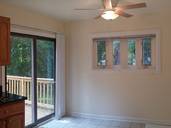 Dining room with glass sliding door to deck