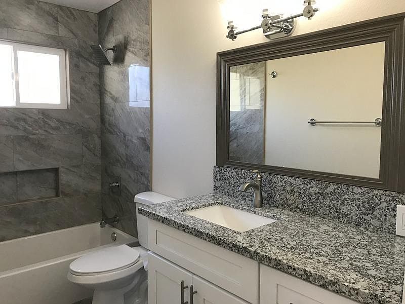Updated Bath with lots of storage.
