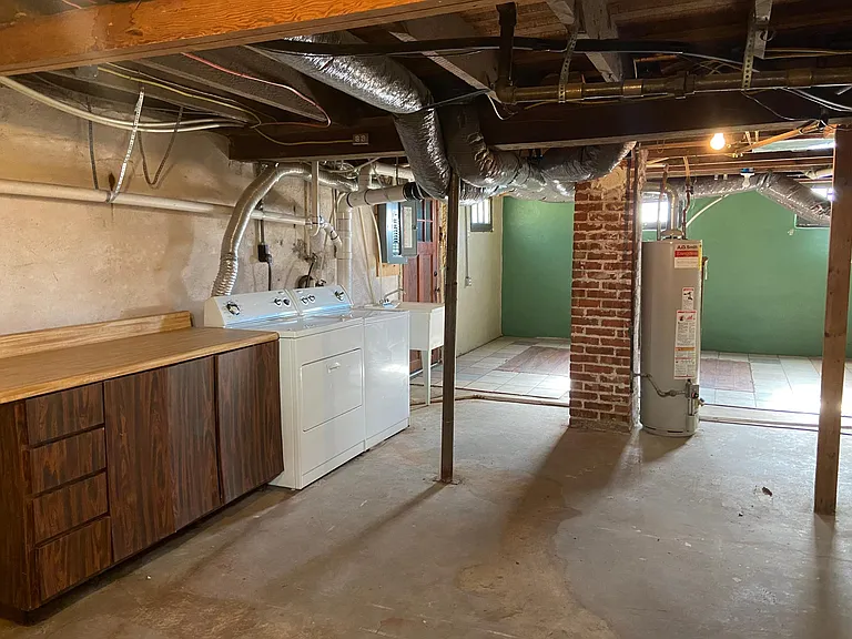 BASEMENT WITH WASHER AND DRYER