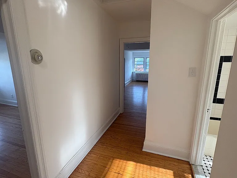 Hallway once in the apartment to the bathroom, living space & bedroom