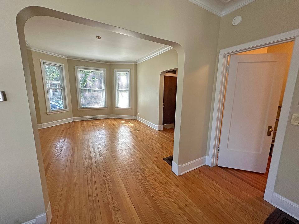 Livingroom w/front entry and office/bdrm 3 on right, off diningroom