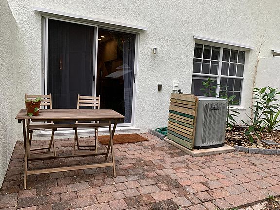 Back porch seating area, facing the woods.