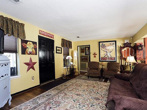 Welcoming sunny palette greets you as you step into the front parlor. Hardwood flooring and opens to the formal dining area.