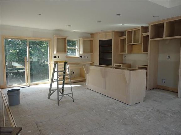 WALK-IN PANTRY BEHIND CUSTOM CABINET DOORS.  GREAT NATURAL LIGHT!