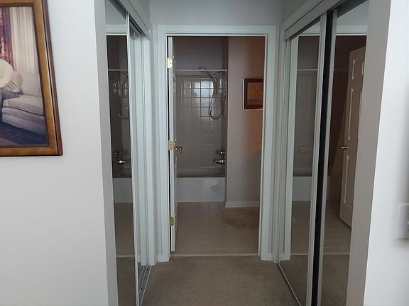 Master double mirrored closets and bath