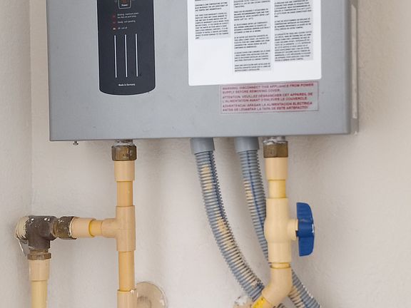 Tank less hot water heater