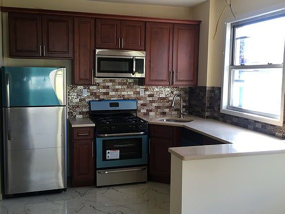 2nd image of 1170 E 95th St #1A
