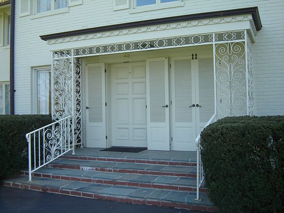 First impressions are important and you will be impressed with the appearance of the front slate steps, surrounded by ornate iron grid with copper eaves overhead.