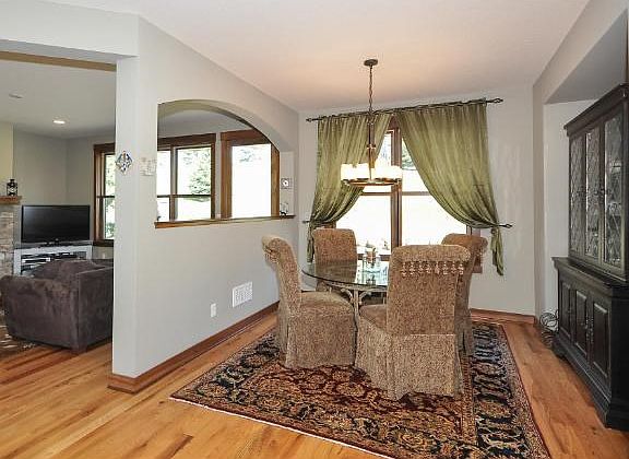 Clever design and architecture creates formal and informal spaces with subtle accents and arches.