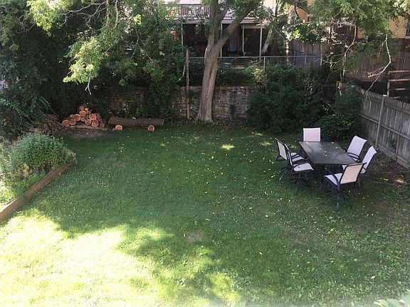 back yard (now a fire pit near the log bench