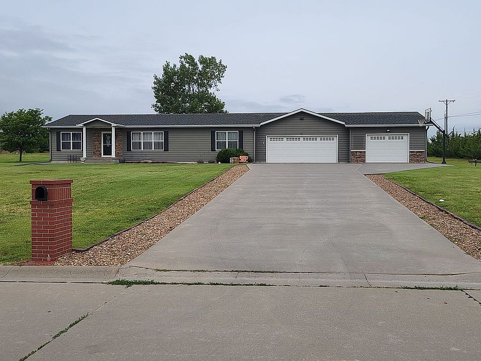 Sits on 1-acre corner lot