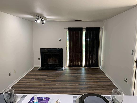 Living Room with Wood Burning Fireplace