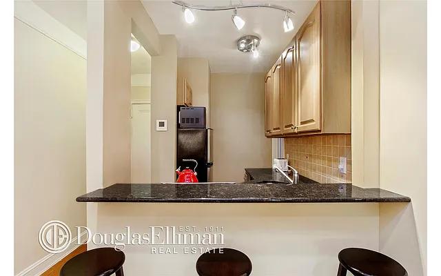 Sold by Douglas Elliman | media 18