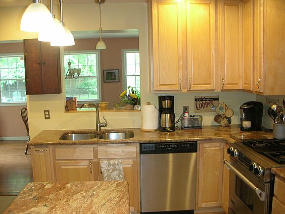 Kitchen with pass-through to addition