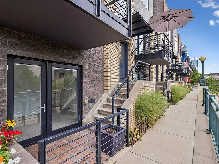 Entrance with maintained landscaping and great security