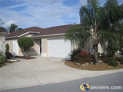 Front of villa with landscaping