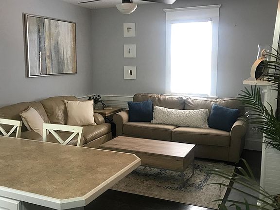 Beautiful hardwood floors and exposed fireplace