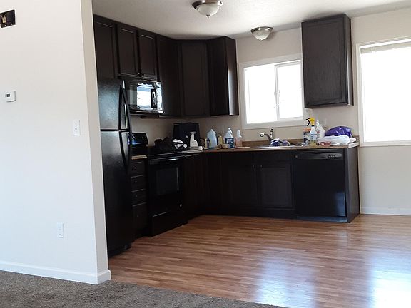 LIVING ROOM LOOKING INTO KITCHEN
