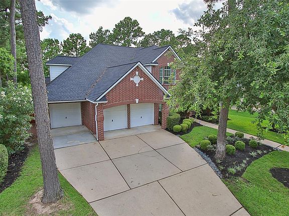 Well landscaped front offers sprinklers and 2014 roof.
