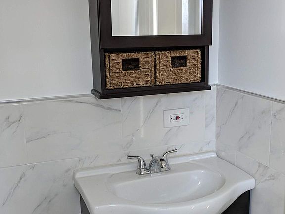 New sink, and tile in bathroom.