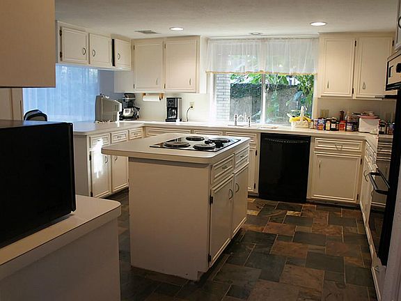 The kitchen window has a bar to serve the outside guest.