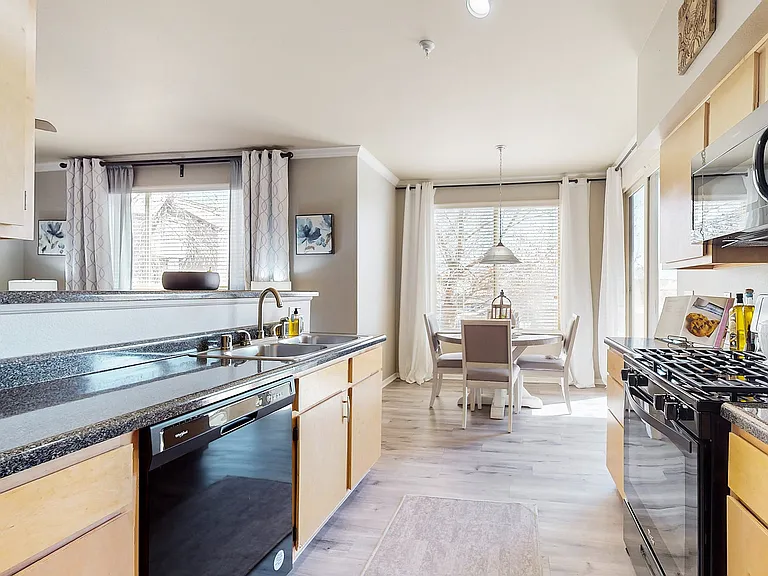 Experience contemporary comfort in this stunning kitchen and dining space.