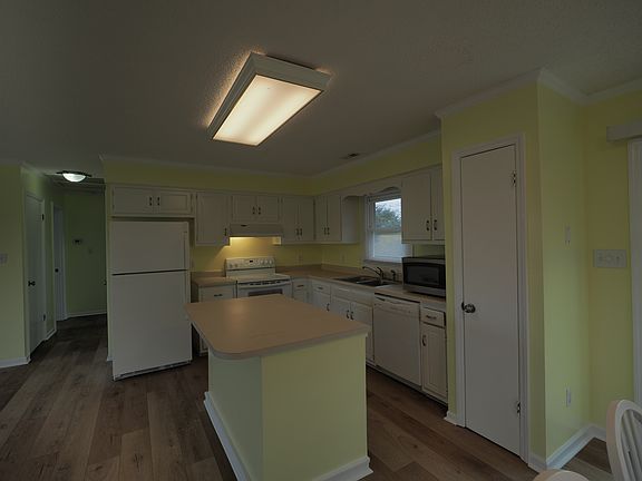 Kitchen and hallway.