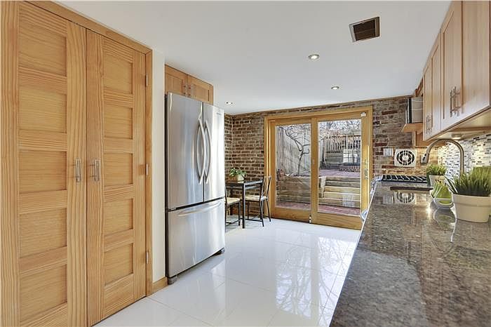 View backwards through kitchen to back yard
